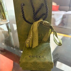 Gucci Silver and Gold Interlocking Earrings